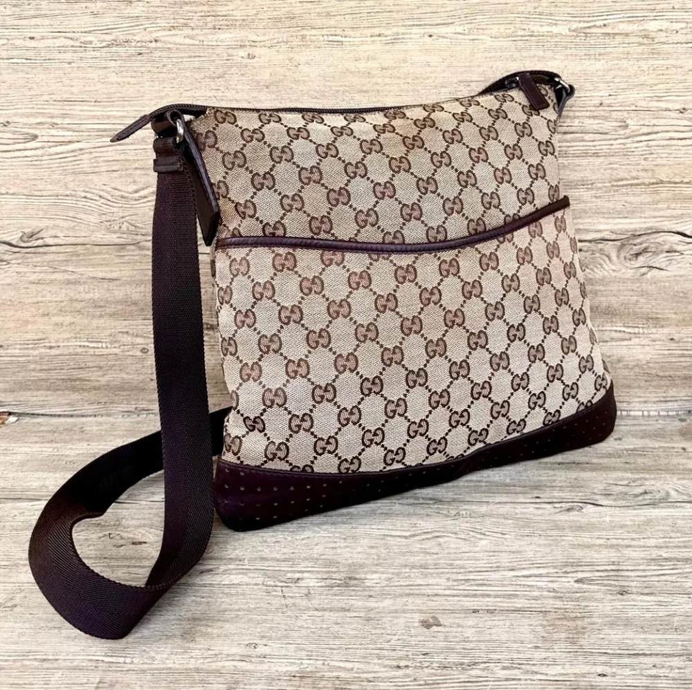 Gucci GG Monogram perforated leather messenger bag